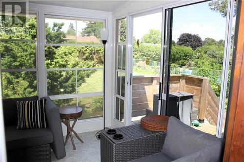 Sunroom leads to deck with BBQ gas hookup - 95 Algonquin Avenue, Long Sault, ON - Indoor Photo Showing Other Room