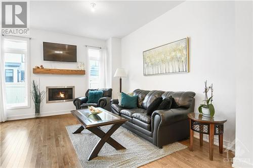 852 Clapham Terrace, Stittsville, ON - Indoor Photo Showing Living Room With Fireplace