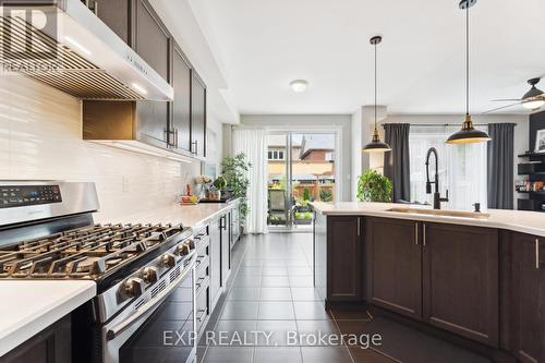 38 Walker Boulevard, New Tecumseth (Alliston), ON - Indoor Photo Showing Kitchen With Upgraded Kitchen