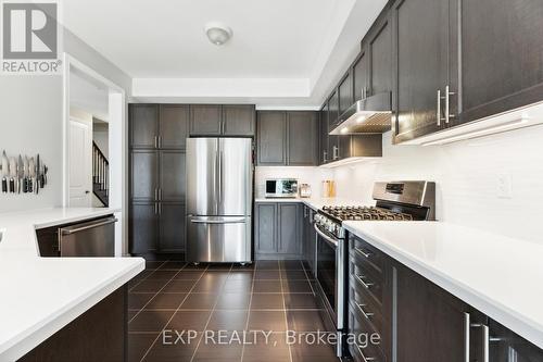 38 Walker Boulevard, New Tecumseth (Alliston), ON - Indoor Photo Showing Kitchen With Upgraded Kitchen