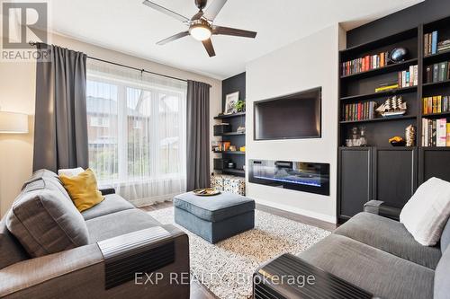 38 Walker Boulevard, New Tecumseth (Alliston), ON - Indoor Photo Showing Living Room With Fireplace