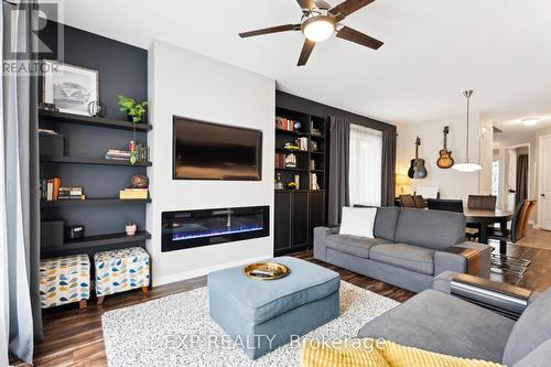 38 Walker Boulevard, New Tecumseth (Alliston), ON - Indoor Photo Showing Living Room With Fireplace