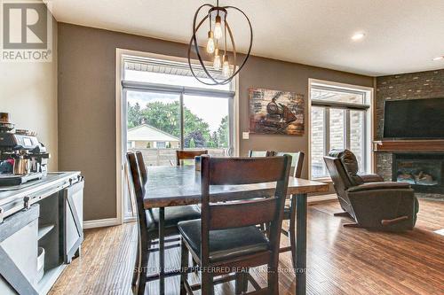 2 Brooker Trail, Thames Centre (Thorndale), ON - Indoor Photo Showing Dining Room With Fireplace