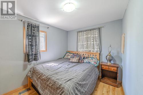 7559 High Country Road, Bridge Lake, BC - Indoor Photo Showing Bedroom