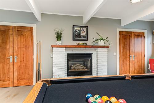 5050 Treadgold Court, Kelowna, BC - Indoor With Fireplace