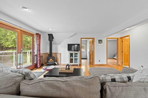 8475 Squilax-Anglemont Road, Anglemont, BC - Indoor Photo Showing Living Room With Fireplace