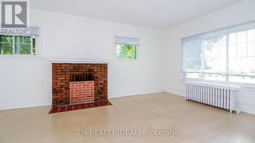 102 West Street N, Orillia, ON - Indoor Photo Showing Other Room With Fireplace