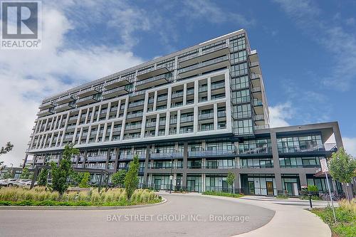 #320 - 50 George Butchart Drive, Toronto W05, ON - Outdoor With Facade