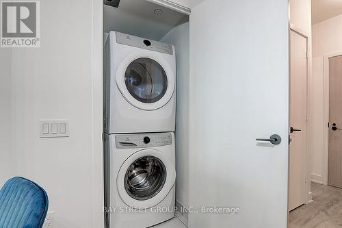 #320 - 50 George Butchart Drive, Toronto W05, ON - Indoor Photo Showing Laundry Room