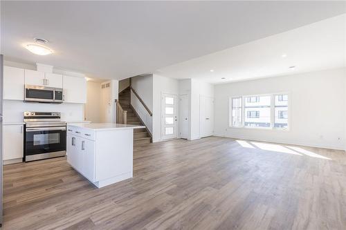 Main Floor Kitchen & Living Area - 4263 Fourth Avenue|Unit #821, Niagara Falls, ON - Indoor Photo Showing Kitchen