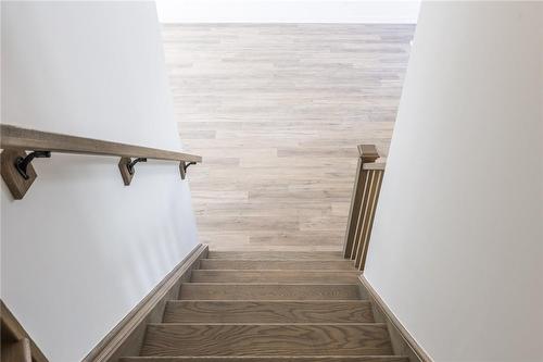 Upgraded Oak Stairs - 4263 Fourth Avenue|Unit #821, Niagara Falls, ON - Indoor Photo Showing Other Room