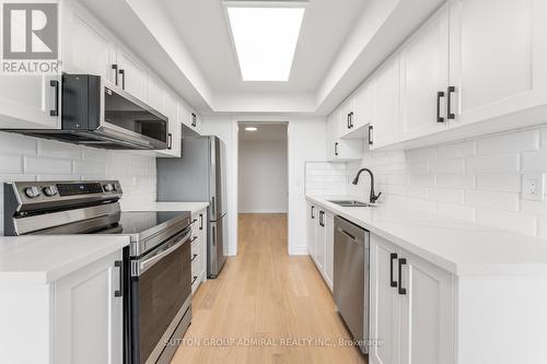 1817 - 18 Sommerset Way, Toronto C14, ON - Indoor Photo Showing Kitchen With Stainless Steel Kitchen With Double Sink With Upgraded Kitchen