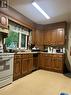 1130 Franklin Avenue, Esterhazy, SK  - Indoor Photo Showing Kitchen With Double Sink 