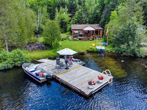 FaÃ§ade - 15 Ch. De L'Élan, Val-Des-Monts, QC - Outdoor With Body Of Water With Deck Patio Veranda