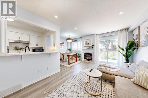 52 - 5033 Pinedale Avenue, Burlington (Appleby), ON - Indoor Photo Showing Living Room With Fireplace