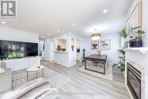 52 - 5033 Pinedale Avenue, Burlington (Appleby), ON - Indoor Photo Showing Living Room With Fireplace