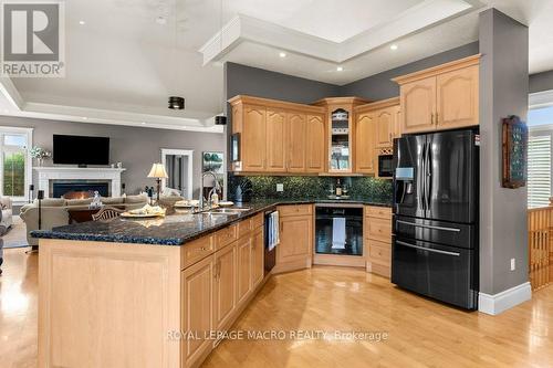 18 Stoney Brae Drive, Brant (South Dumfries), ON - Indoor Photo Showing Kitchen With Fireplace