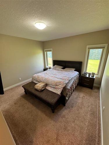 1 18 Outback Drive, Brandon, MB - Indoor Photo Showing Bedroom