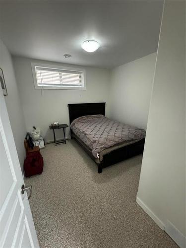 1 18 Outback Drive, Brandon, MB - Indoor Photo Showing Bedroom