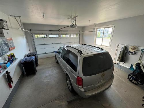 1 18 Outback Drive, Brandon, MB - Indoor Photo Showing Garage