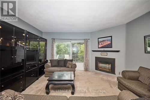 84 Merritt Street, St. Catharines, ON - Indoor Photo Showing Living Room With Fireplace