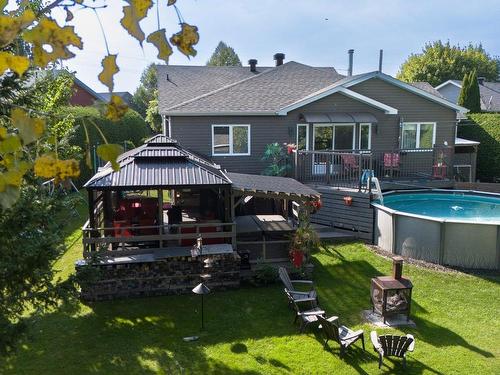 Back facade - 1450 Rue John-Carey, Drummondville, QC - Outdoor With Above Ground Pool With Deck Patio Veranda