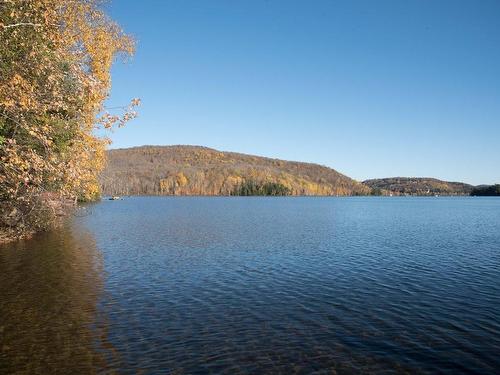 Waterfront - 207 Ch. Des Boisés, Mont-Tremblant, QC - Outdoor With Body Of Water With View