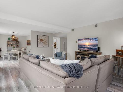 300-49 Robinson St, Hamilton, ON - Indoor Photo Showing Living Room