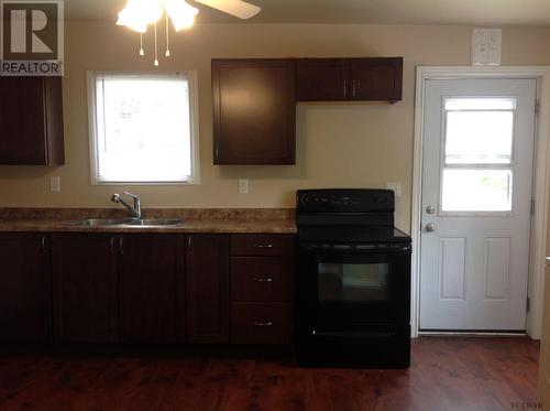 283 Meridian Ave, Temiskaming Shores, ON - Indoor Photo Showing Kitchen With Double Sink