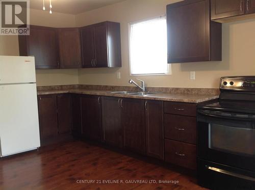 283 Meridian Avenue, Temiskaming Shores, ON - Indoor Photo Showing Kitchen With Double Sink