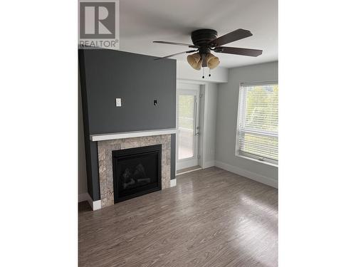 221 2055 Ingledew Street, Prince George, BC - Indoor Photo Showing Living Room With Fireplace