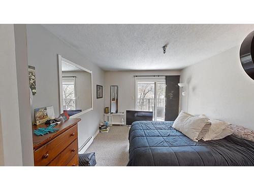 7 - 1691 Highway 3A, Nelson, BC - Indoor Photo Showing Bedroom