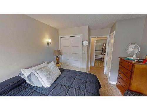 7 - 1691 Highway 3A, Nelson, BC - Indoor Photo Showing Bedroom