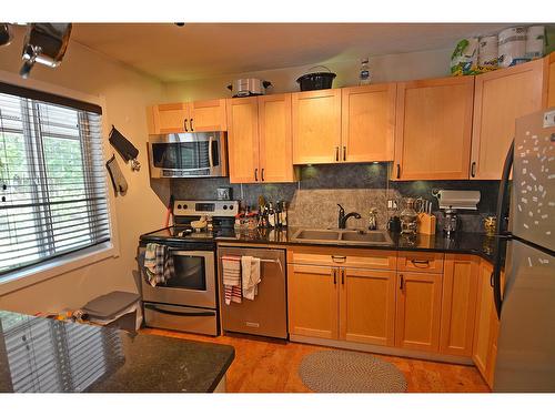 7 - 1691 Highway 3A, Nelson, BC - Indoor Photo Showing Kitchen With Stainless Steel Kitchen With Double Sink