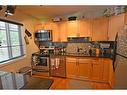 7 - 1691 Highway 3A, Nelson, BC  - Indoor Photo Showing Kitchen With Stainless Steel Kitchen With Double Sink 