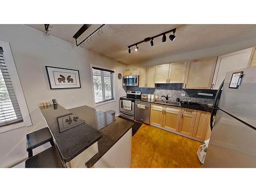 7 - 1691 Highway 3A, Nelson, BC - Indoor Photo Showing Kitchen With Double Sink