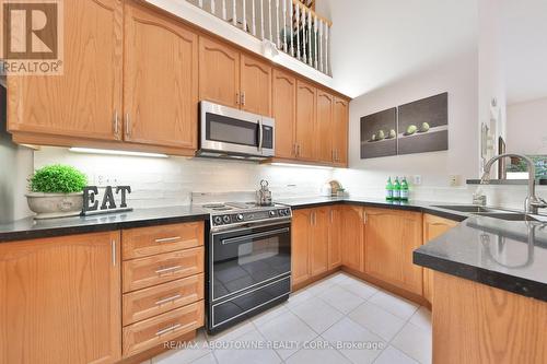 11 - 1010 Cristina Court N, Mississauga, ON - Indoor Photo Showing Kitchen With Double Sink