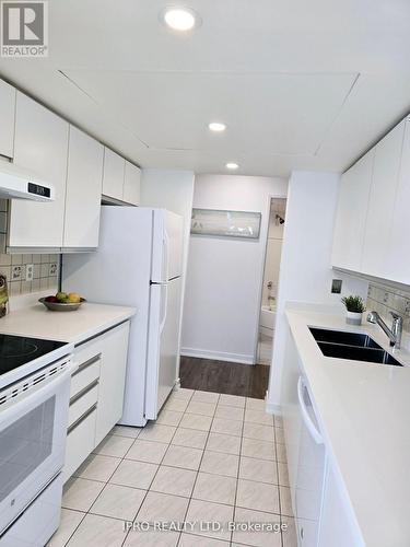 306 - 5 Rowntree Road S, Toronto, ON - Indoor Photo Showing Kitchen With Double Sink