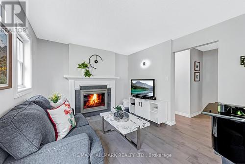 4056 Stonemason Crescent, Mississauga, ON - Indoor Photo Showing Living Room With Fireplace
