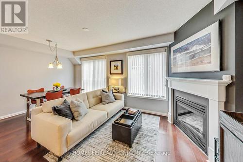 921 - 16 Laidlaw Street, Toronto, ON - Indoor Photo Showing Living Room With Fireplace