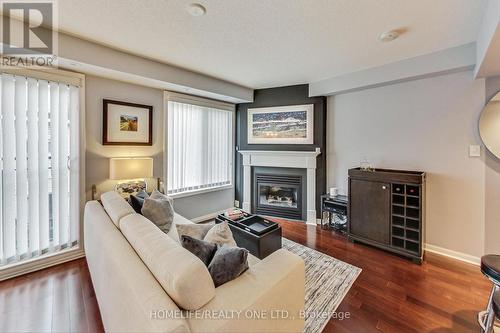 921 - 16 Laidlaw Street, Toronto, ON - Indoor Photo Showing Living Room With Fireplace