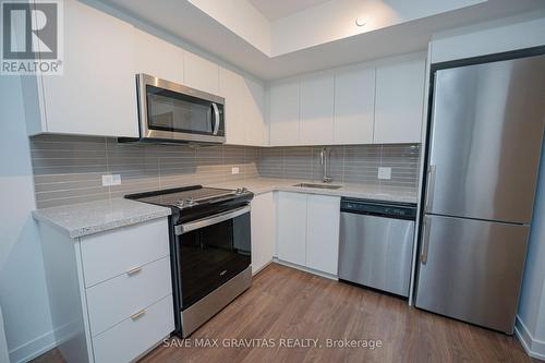 608 - 30 Tretti Way, Toronto C06, ON - Indoor Photo Showing Kitchen