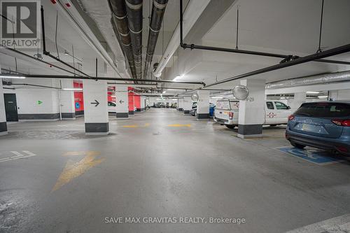 608 - 30 Tretti Way, Toronto C06, ON - Indoor Photo Showing Garage