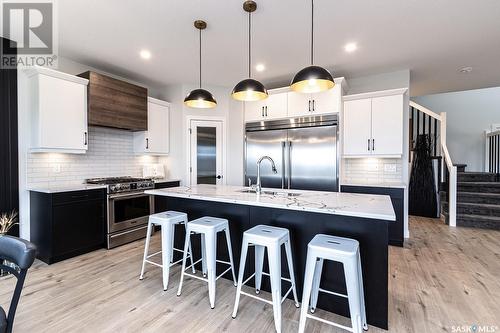 12 Plains Green, Pilot Butte, SK - Indoor Photo Showing Kitchen With Upgraded Kitchen