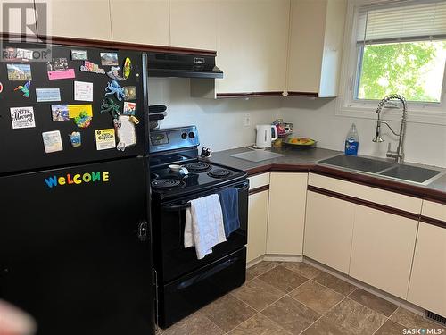 7316 6Th Avenue, Regina, SK - Indoor Photo Showing Kitchen With Double Sink