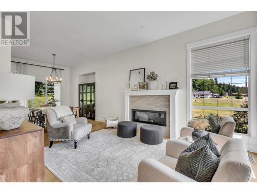 9384 Summerset Place, Prince George, BC - Indoor Photo Showing Living Room With Fireplace