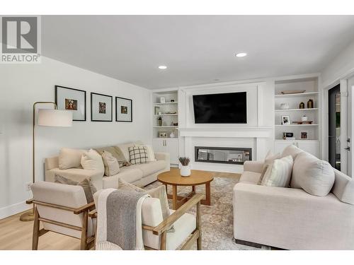 9384 Summerset Place, Prince George, BC - Indoor Photo Showing Living Room With Fireplace