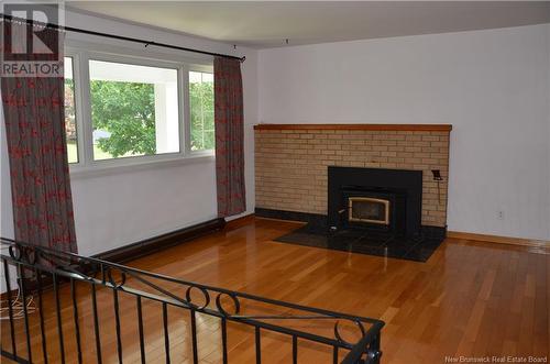 1977 Craig Street, Bathurst, NB - Indoor Photo Showing Living Room With Fireplace