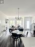 5206 Squires Road, Regina, SK  - Indoor Photo Showing Dining Room With Fireplace 