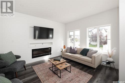 5206 Squires Road, Regina, SK - Indoor Photo Showing Living Room With Fireplace